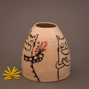 Vase of cat courtship red